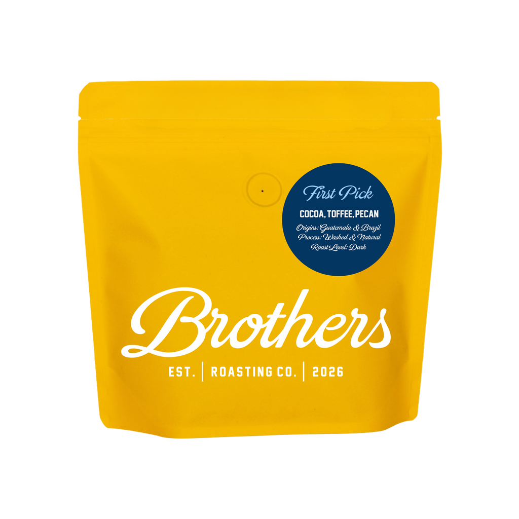 A bright yellow stand-up pouch of Brothers Coffee Roasting Co. on a plain white background.