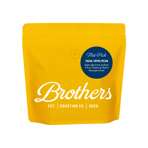 A bright yellow stand-up pouch of Brothers Coffee Roasting Co. on a plain white background.